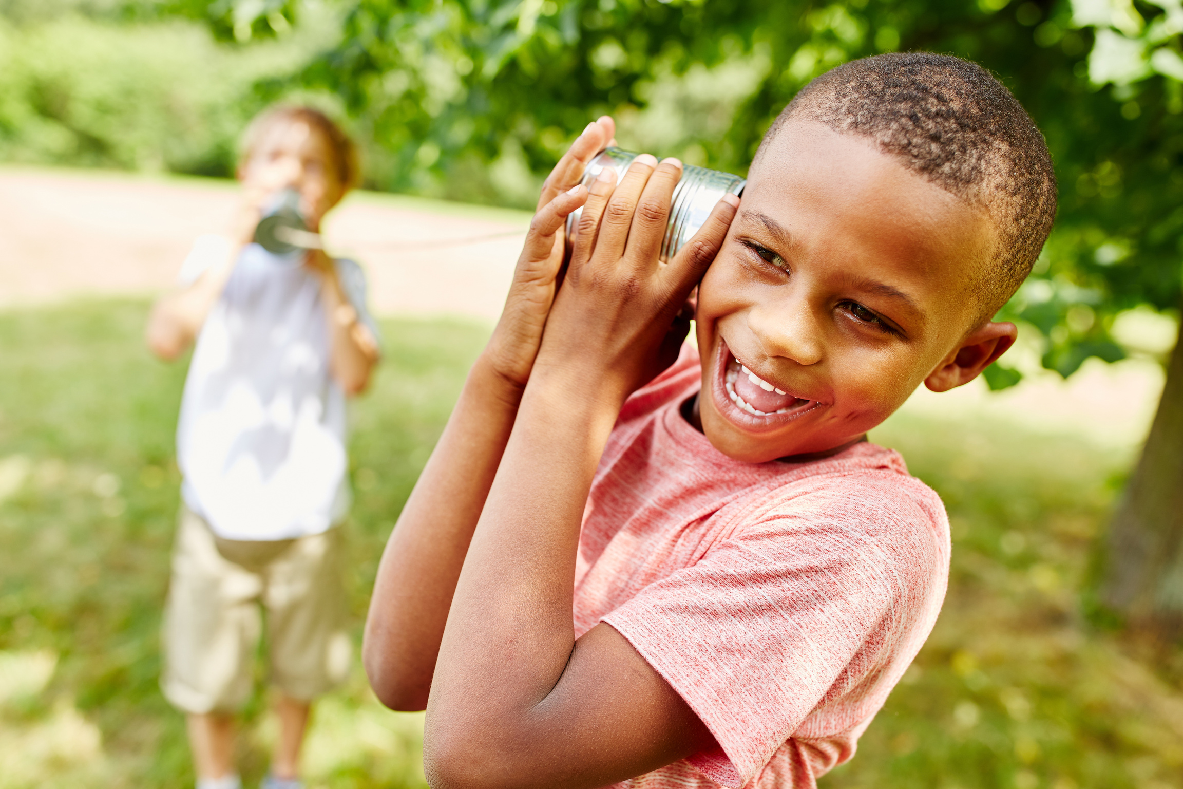 African Child with Tin Can Telephone